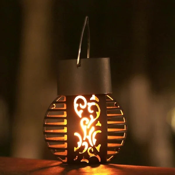 2+2 GRATIS: Lampa solara de gradina, efect de flacara, cu suport de agatare, lumina calda, dimensiuni 7 X 7 X 9 Cm, din ABS si plastic, negru
